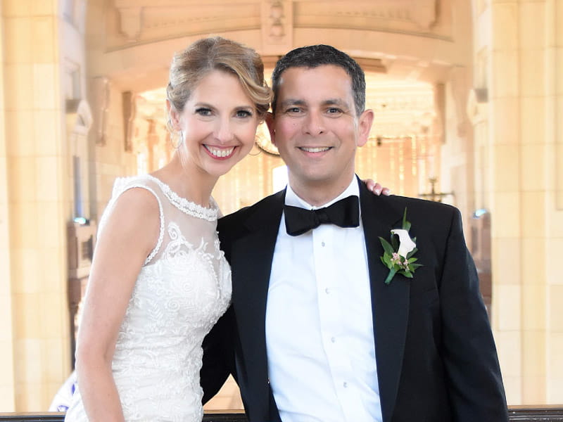 Heart attack survivor Angie Loving (left) and her husband, Sam Abadir. (Photo courtesy of Desi Kurkowski Studio)