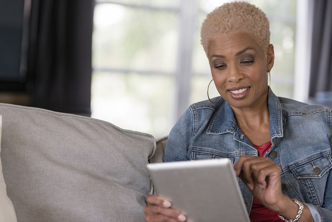 African American woman on tablet