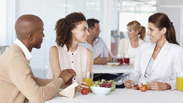 3 people eating fruit