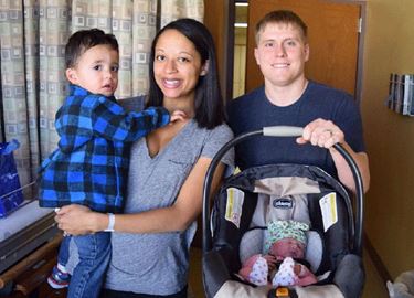 Jen Rohe and her family in hospital room