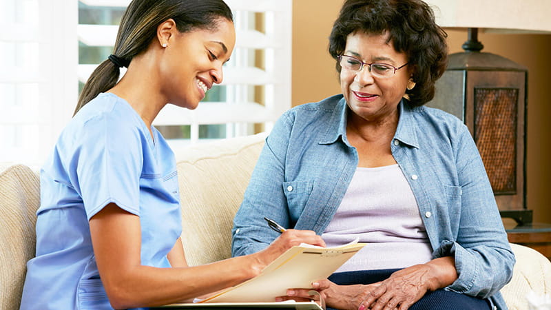 nurse giving instructions to patient