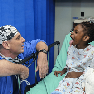 Doctor meeting with young patient in hospital